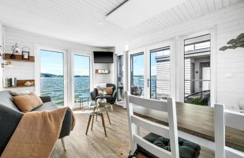 Schleswig Boat Rental | Hausboot Glücksmomente mit Dachterrasse in Schleswig am Ostseefjord Schlei