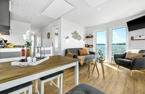 Schleswig Boat Rental | Hausboot Glücksmomente mit Dachterrasse in Schleswig am Ostseefjord Schlei