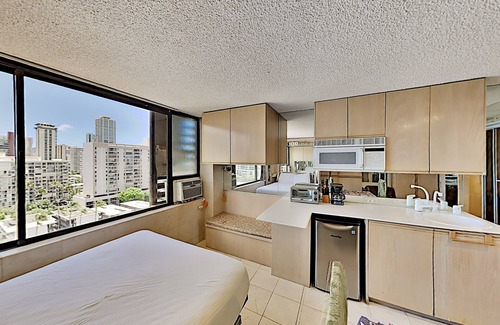 McCully - Moiliili Condo | Hawaiian Monarch 1607 Condo by RedAwning