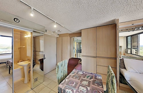 McCully - Moiliili Condo | Hawaiian Monarch 1607 Condo by RedAwning
