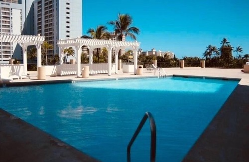 McCully - Moiliili Condo | Hawaiian Monarch 1611 Condo by RedAwning