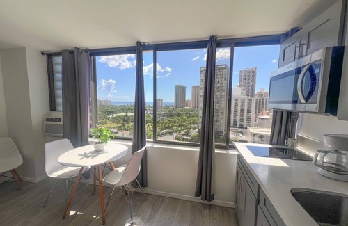 McCully - Moiliili Condo | Hawaiian Monarch 1804 Condo by RedAwning