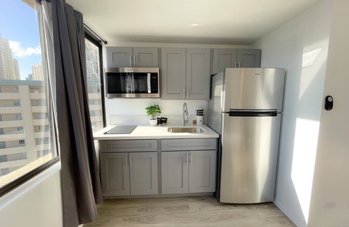 McCully - Moiliili Condo | Hawaiian Monarch 1804 Condo by RedAwning