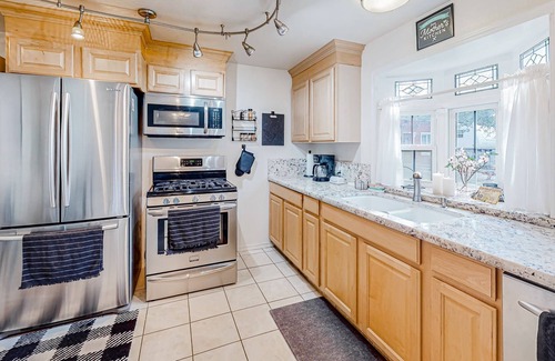 Burley House | Heartland historic home near local festivals with seasonal garden & mtn views