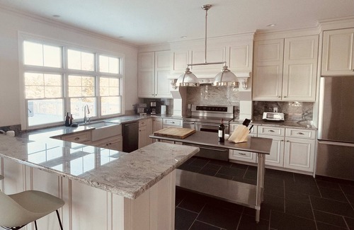 Southold House | HEATED POOL waterfront HOT TUB, GYM, Watersports, BOATER DELIGHT luxury modern