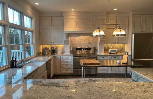 Southold House | HEATED POOL waterfront HOT TUB, GYM, Watersports, BOATER DELIGHT luxury modern