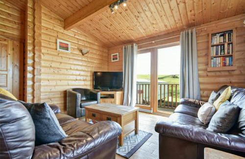 Bamburgh House | Heather Cottages - Grey Heron