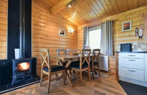 Bamburgh House | Heather Cottages - Grey Heron
