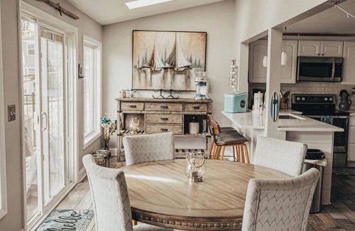 Portage Lakes Cottage | HEAVENLY Portage Lakes water front 4-bedroom cottage with HOTTUB, dog friendly!