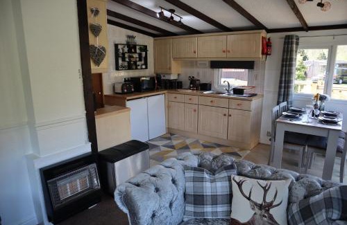 Builth Wells Ski Chalet | HEDDFAN, Luxury 3 bedroom timber lodge, Now with WiFi, Caer Beris Holiday Park, Builth Wells, SORRY NO TRADESMEN OR CONTRACTORS ALLOWED
