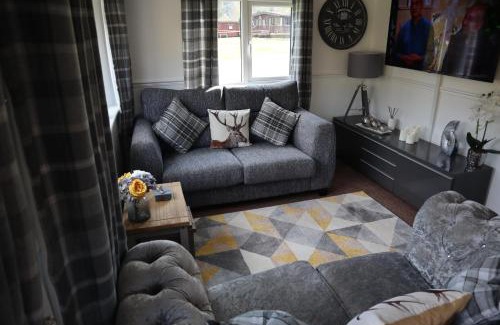 Builth Wells Ski Chalet | HEDDFAN, Luxury 3 bedroom timber lodge, Now with WiFi, Caer Beris Holiday Park, Builth Wells, SORRY NO TRADESMEN OR CONTRACTORS ALLOWED