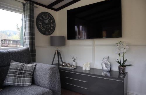 Builth Wells Ski Chalet | HEDDFAN, Luxury 3 bedroom timber lodge, Now with WiFi, Caer Beris Holiday Park, Builth Wells, SORRY NO TRADESMEN OR CONTRACTORS ALLOWED
