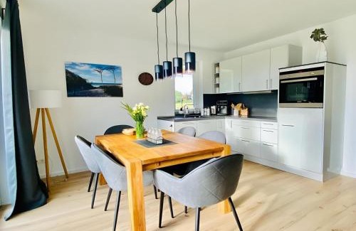 Am Salzhaff House | Heimathafen 1 - Ferienhaus mit Kamin, Sauna und Meerblick