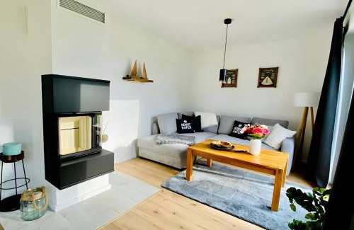 Am Salzhaff House | Heimathafen 1 - Ferienhaus mit Kamin, Sauna und Meerblick