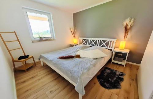 Am Salzhaff House | Heimathafen 1 - Ferienhaus mit Kamin, Sauna und Meerblick