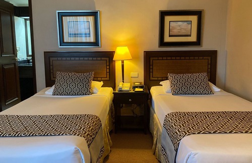 San Isidro Hotel | Herald Suites Solana