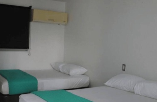 Taganga Hotel | Hermosa Habitacion Superior Triple En Playas De Taganga