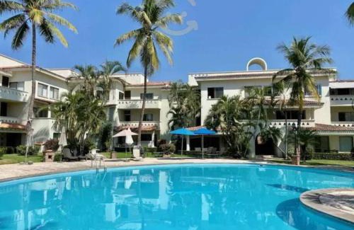 Olas Altas Apartment | Hermoso apartamento en Manzanillo con alberca y cancha de tenis, Ideal para relajarse y disfrutar de una escapada tranquila en el paraíso tropical