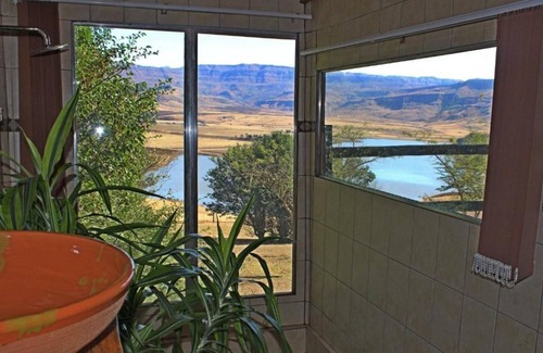 Giant's Castle Game Reserve Ski Chalet | Hidden Gem with magnificent lake and mountain views.