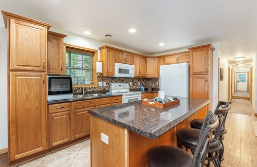 Higgins Lake House | Higgins Lake Private Beachfront Home w/Dock, Boat Mooring, Sunset & Sunrise View