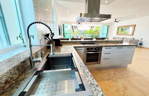 Puerto Aventuras Apartment | High-End Waterfront Condo Secrets Waters