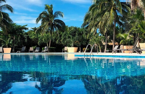 Puerto Aventuras Apartment | High-End Waterfront Condo Secrets Waters