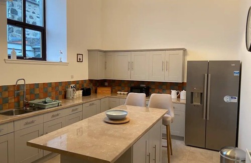 Gardenstown House | High Green Hall - a modernly converted church on a hill