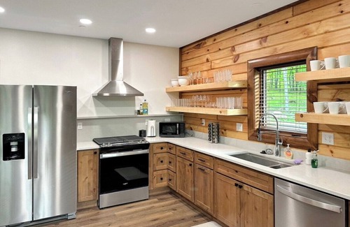 McHenry Cabin | Hillside Hideaway · NEW! Indoor Pool, Hot Tub, Fire Pit, & EV Charger