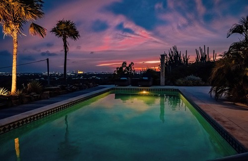 Alto Vista Villa | Hillside Retreat brings together picturesque views with a magnificent island backdrop.