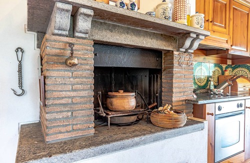Magliano in Toscana Villa | Hilltop farmhouse with pool and sea view
