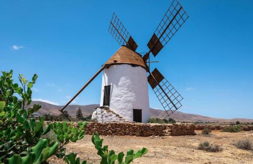 Antigua Villa | Histórica Villa con molino de viento