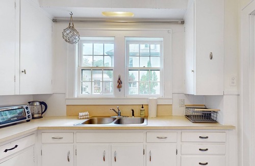 Montpelier House | Historic 1860s farmhouse & back house with a large yard, washer/dryer, & deck