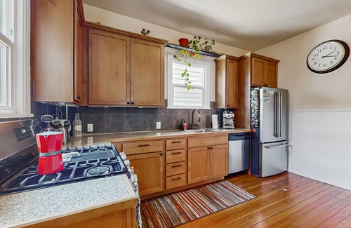 Central District House | Historic 1903 Home with Typewriter Charm & Timeless Soul