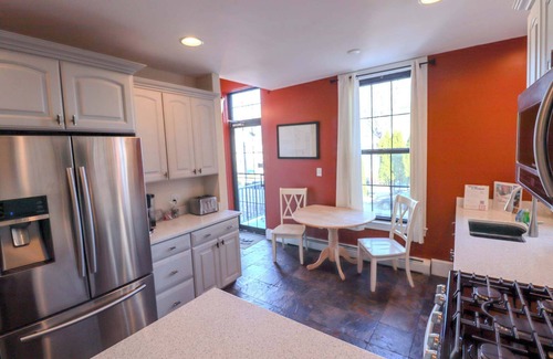Pond Cove Condo | Historic Brick Corner Apartment, off street parking