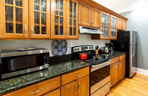 Beach Institute Apartment | Historic Charming Cottage with King Bed for Two by Lucky Savannah