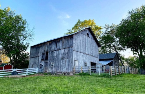 Greenville House | Historic Hudson Valley farmhouse with scenic barn and fire pit on a working farm