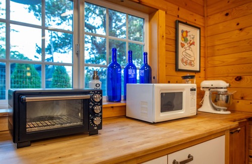 Eastsound Cabin | Historic lodge, new wing, ocean-front, private beach, kayaks, hot tub, and more!