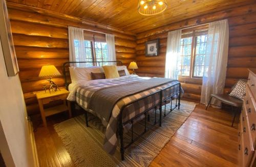 Rapid City House | Historic Log Cabin #14 at Horse Creek Resort