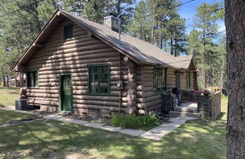 Rapid City House | Historic Log Cabin #14 at Horse Creek Resort