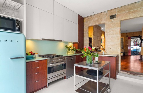Redfern House | Historic sandstone home with designer interior & tropical garden. pets welcome!
