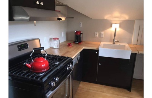 Lowry Hill East House | Historic Tudor Meets Modern Decor in Hip Uptown
