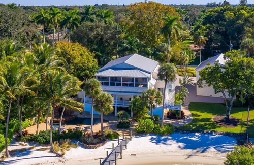 Fort Myers House | Historic Waterfront Home with 130' Private Beach, Dock, and Pool