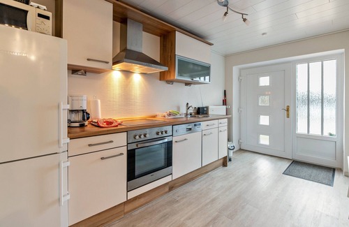 Rude Apartment | Holiday Apartment Rüde-Mühle with Private Terrace, Private Garden and Wi-Fi