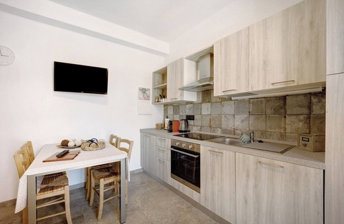 Andora Apartment | Holiday Apartment "Antichi Ricordi - Il Pollaio" with Private Terrace, Shared Pool & Wi-Fi