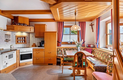 Goldegg Apartment | Holiday Apartment 'Biobergbauernhof Bergzeit' with Mountain View, Private Terrace and Wi-Fi
