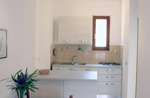 Madonna delle Grazie Apartment | Holiday apartment Capoliveri for 1 - 4 persons with 2 bedrooms - Row house