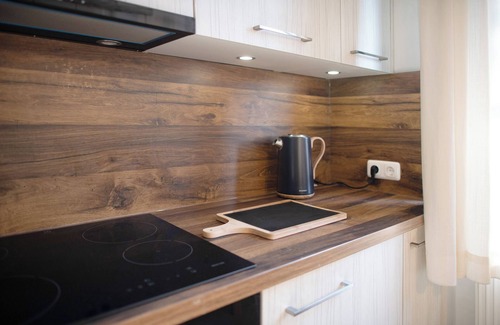 Muritz Apartment | Holiday Apartment 'FeWo E1' with Shared Garden and Wi-Fi