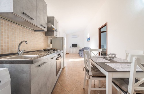 Masainas Apartment | Holiday Apartment "Is Lais 2" with Sea View, Shared Garden & Wi-Fi