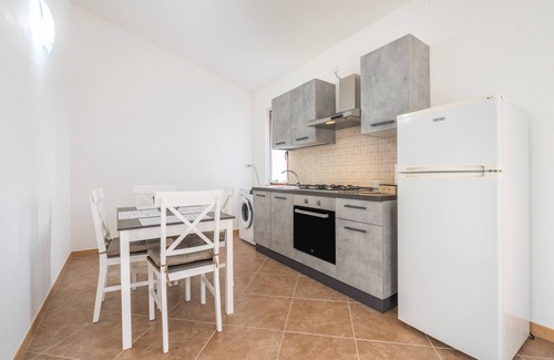 Masainas Apartment | Holiday Apartment "Is Lais 2" with Sea View, Shared Garden & Wi-Fi