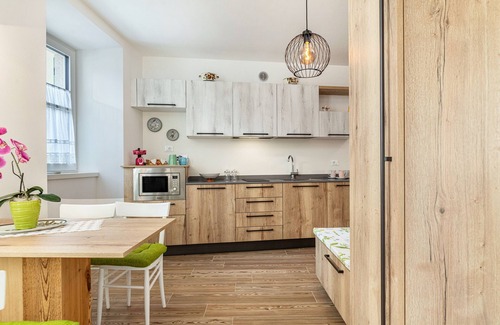 Levico Terme Apartment | Holiday Apartment 'L'Antica Corte Apt Elena' with Mountain View, Terrace & Wi-Fi